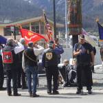 Bob Ridley, a U.S. Navy veteran, sings the national anthem during a Memorial Day ceremony at midday Monday at the Southeast Alaska Native Veterans Memorial Park next to Elizabeth Peratrovich Hall. (Mark Sabbatini / Juneau Empire)