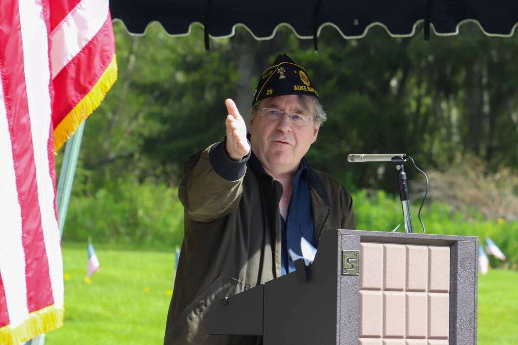 Duff Mitchell, commander of American Legion Auke Bay Post #25, addresses those gathered at a Memorial Day ceremony at Alaskan Memorial Park on Monday. (Jasz Garrett / Juneau Empire)