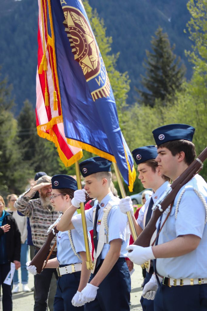 Sgt. Jeremiah Helms, Sgt. Wesson Lotz, Airman Vincent Hayes and Airman Bailey Israelson of the Southeast Civil Air Patrol present the color guard during a Memorial Day ceremony at Alaskan Memorial Park on Monday. (Jasz Garrett / Juneau Empire)