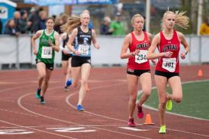 Juneau-Douglas High School: Yadaa.at Kalés Ida Meyer (301) and Etta Eller (294) lead the 3,200 at the ASAA/First National Bank Alaska Track and Field State Championships on Saturday. (Pete Pounds / Alaska Sports Report)
