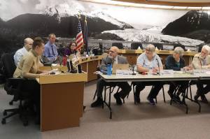 Abi Spofford, a Juneau resident who said she suffered a mental health crisis that resulted in her seeking treatment at Bartlett Regional Hospital nine months ago, testifies during a joint meeting of the hospitals board of directors and the Juneau Assembly on Wednesday night where cuts to such programs were considered. (Mark Sabbatini / Juneau Empire)