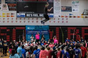 Nick Hanson of the NBC show American Ninja Warrior kicks off the blanket toss at the 2020 Traditional Games in Juneau. (Lyndsey Brollini / Sealaska Heritage Institute)