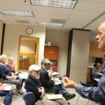 Quigley Peterson, a longtime doctor at Bartlett Regional Hospital, speaks in favor of its hospice and home health programs during a public forum at the hospital Tuesday to get feedback on proposed cuts to certain programs. (Mark Sabbatini / Juneau Empire)