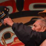 Alaska Native veteran Marvin Kadake arrives on stage in his wheelchair during the Grand Entrance. (Jasz Garrett / Juneau Empire)