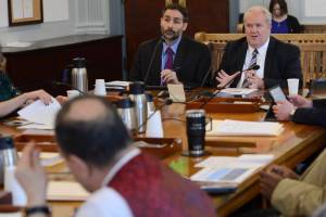 Akis Gialopsos (left), deputy executive director of the Alaska Housing Finance Corp., and Bryan Butcher (right), the corporations CEO/executive director, testify in front of the Senate Finance Committee on Feb. 8. (James Brooks/Alaska Beacon)