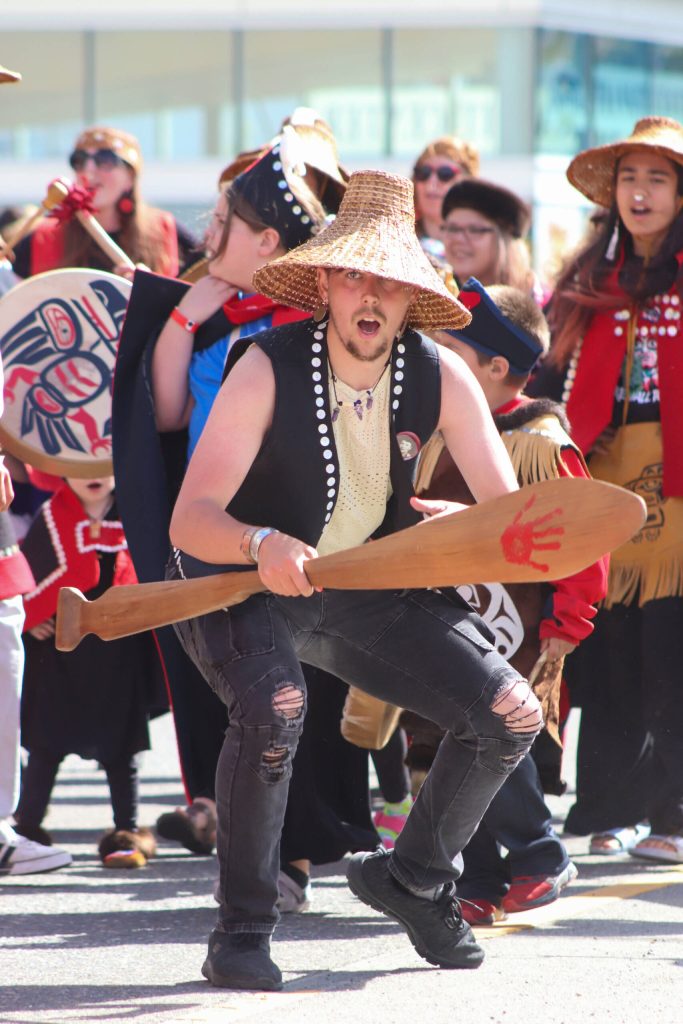 Corey Marsden dances during the Celebration parade. (Jasz Garrett / Juneau Empire)
