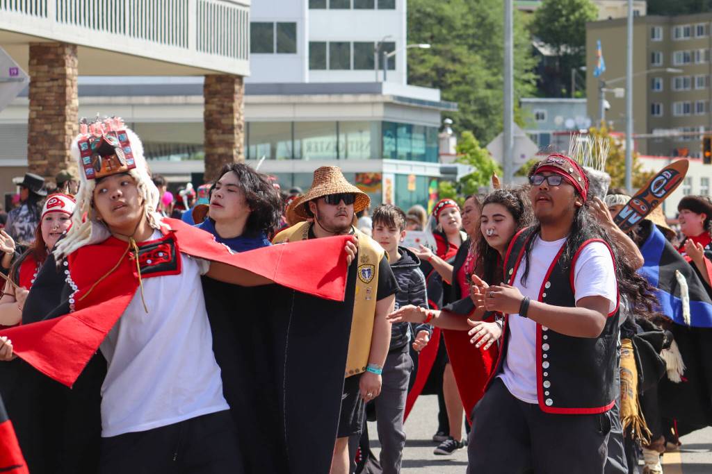 The Douglas Indian Association dances in the parade. (Jasz Garrett / Juneau Empire)