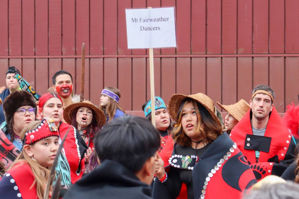The Mt. Fairweather dance group before entering Centennial Hall for the Grand Exit ceremony on Saturday evening. (Jasz Garrett / Juneau Empire)