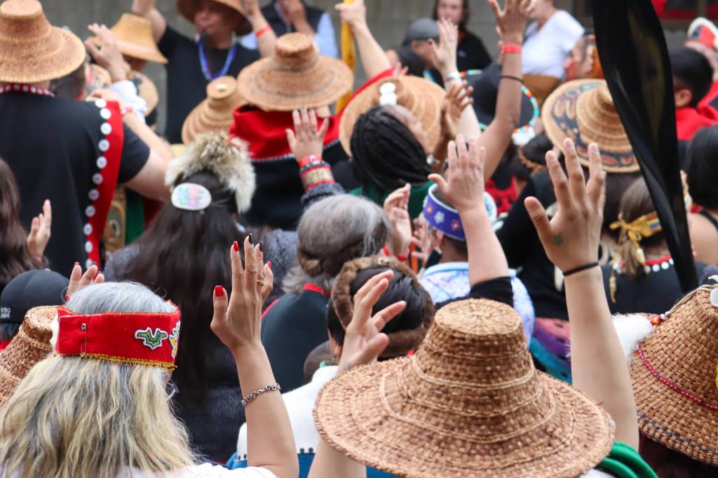 The Woosh.ji.een dancers outside during the Grand Exit of Celebration on Saturday evening. (Jasz Garrett / Juneau Empire)