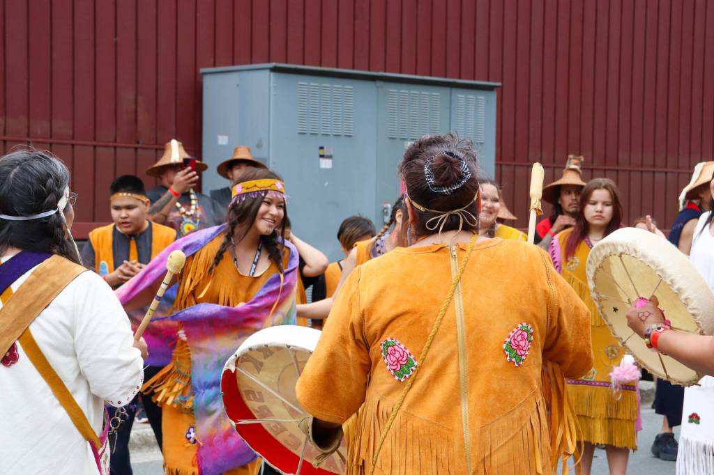 The Selkirk Spirit Dancers dance outside during the Grand Exit on Saturday evening. (Jasz Garrett / Juneau Empire)