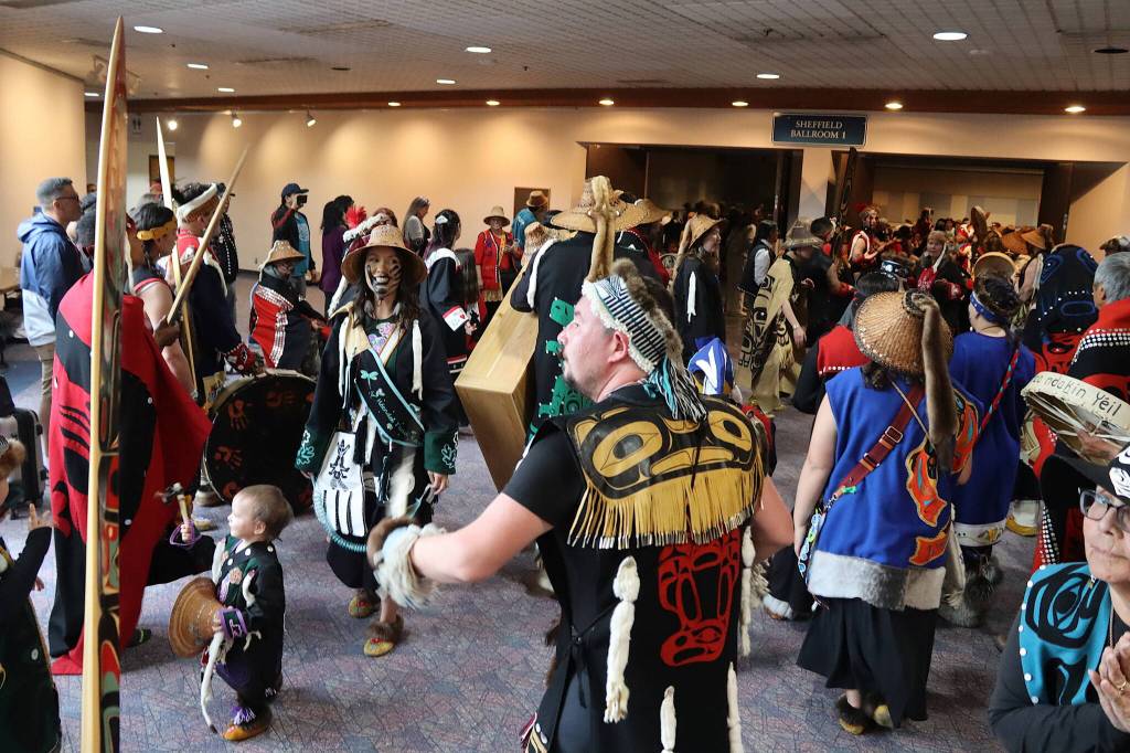 The final dancers exit the ballroom at Centennial Hall during the Grand Exit ceremony to end Celebration on Saturday night. (Mark Sabbatini / Juneau Empire)