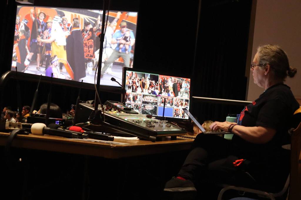 A video technician monitors the cameras providing a livestream of Celebration during the Grand Exit ceremony on Saturday night at Centennial Hall. (Mark Sabbatini / Juneau Empire)