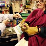 JRC volunteer Kathy Benner holds Lady Baltimore for a talon trim. (Photo courtesy of Kathy Benner)