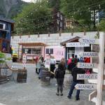 Customers line up at the Deckhand Daves food truck at the entrance of the owners expanded food court on Franklin Street on Friday evening. The food court that has been open for years now occupies the lot where the Elks Lodge stood until it was demolished last year. (Mark Sabbatini / Juneau Empire)