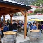 Customers gather in the seating area of an expanded food court area on Franklin Street on Friday. Reconstruction work that began last fall was recently completed for the facility scheduled to be open between May and September. (Mark Sabbatini / Juneau Empire)