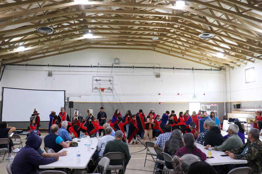 The Angoon Youth Dance Group performs in the Angoon Elementary School gymnasium for the Thayer Creek hydroelectric project celebration on Friday. (Jasz Garrett / Juneau Empire)