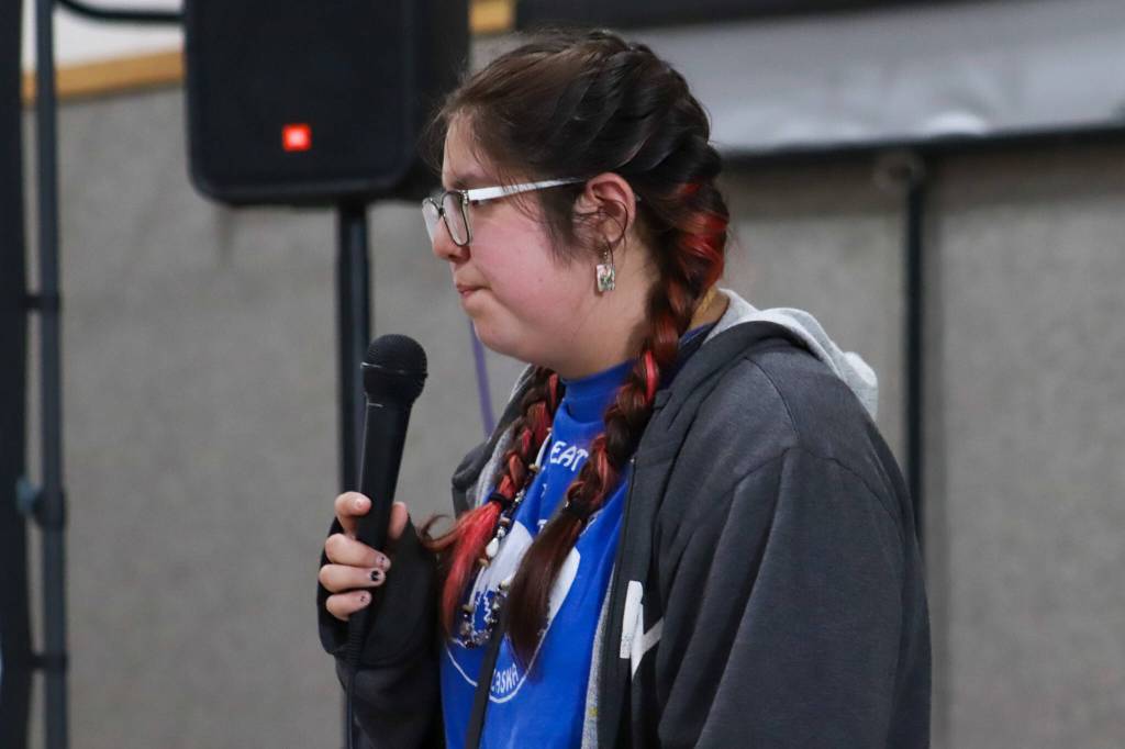 Nadine Demmert, a senior at Angoon High School, gives a speech at the community celebration on Friday. (Jasz Garrett / Juneau Empire)