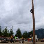 A woman nears the designated point during the speed climbing competition at Juneau Gold Rush Days on Sunday at Savikko Park. (Mark Sabbatini / Juneau Empire)