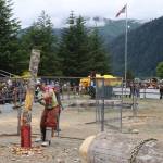 Jesse Stringer, foreground, and Jeff Trego compete in the mens vertical chopping competition during Juneau Gold Rush Days at Savikko Park on Sunday. (Mark Sabbatini / Juneau Empire)