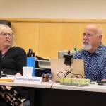 Kenny Solomon-Gross (right), president of Bartlett Regional Hospitals board of directors, offers an assessment of resolutions intended to address the hospitals financial crisis during a meeting Tuesday night as board Vice President Deborah Johnston listens. (Mark Sabbatini / Juneau Empire)