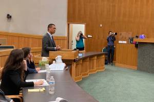 Elbert Lin, a Virginia attorney contracted by the state of Alaska to argue its appeal in the State of Alaska, Department of Education and Early Development v. Alexander case, addresses Alaska Supreme Court justices on Thursday in Anchorage. (Andrew Kitchenman/Alaska Beacon)
