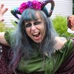 Jasz Garrett / Juneau Empire
Kaylie Simpson poses with a turkey leg from Vs Cellar Door at the Masters Faire on Saturday.