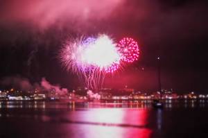 Red, white and blue shoot off in Juneau to celebrate Independence Day. (Jasz Garrett / Juneau Empire)