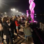 A crowd watches the Fourth of July fireworks show from the downtown cruise ship dock shortly after midnight Thursday. (Mark Sabbatini / Juneau Empire)
