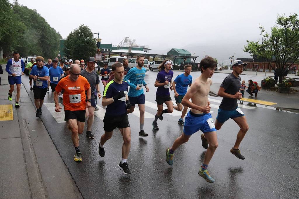 Runners start the Goldbelt Tram-Mount Roberts Trail Run in downtown Juneau on Saturday. (Mark Sabbatini / Juneau Empire)
