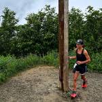 Heidi Reifenstein reaches Father Browns Cross to complete the Goldbelt Tram-Mount Roberts Trail Run on Saturday, setting a new womens record for the 3½-mile race with a time of 37 minutes and 40 seconds. (Photo by Jeff Gnass)