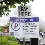 A pay to park sign is seen by the Downtown Transit Center on July 2, 2024. (Jasz Garrett / Juneau Empire)