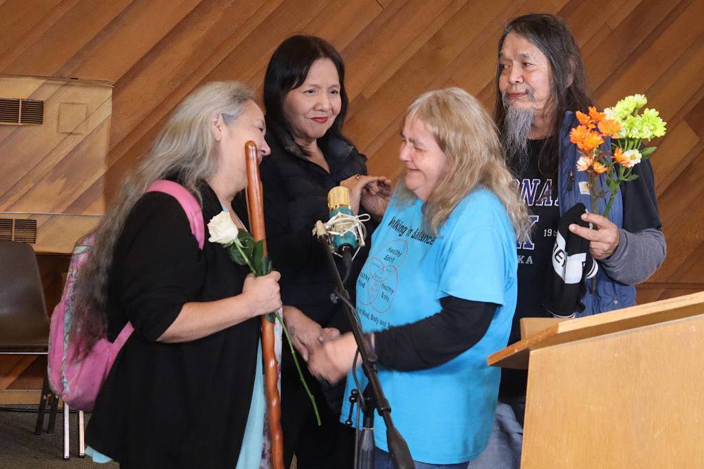 Friends of Steven Kissack congregate at a vigil for him Tuesday evening at Resurrection Lutheran Church. (Mark Sabbatini / Juneau Empire)