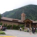 People gather outside Resurrection Lutheran Church on Tuesday evening before a vigil for Steven Kissack, a longtime Juneau resident experiencing homelessness who was fatally shot by police on Monday. (Mark Sabbatini / Juneau Empire)