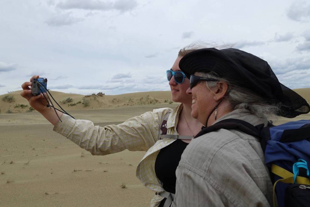 Fifteen-year-old Ida Bodony takes a selfie of herself and her mother Karin Bodony in the Nogahabara Dunes. They were there recently for a week to perform research recently in the heart of the Koyukuk National Wildlife Refuge. (Photo by Ned Rozell)
