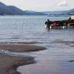 Ernest Hart pulls his suction dredge closer to shore as the tide comes in. In the background are DIPACs hatchery floats. (Jasz Garrett / Juneau Empire)