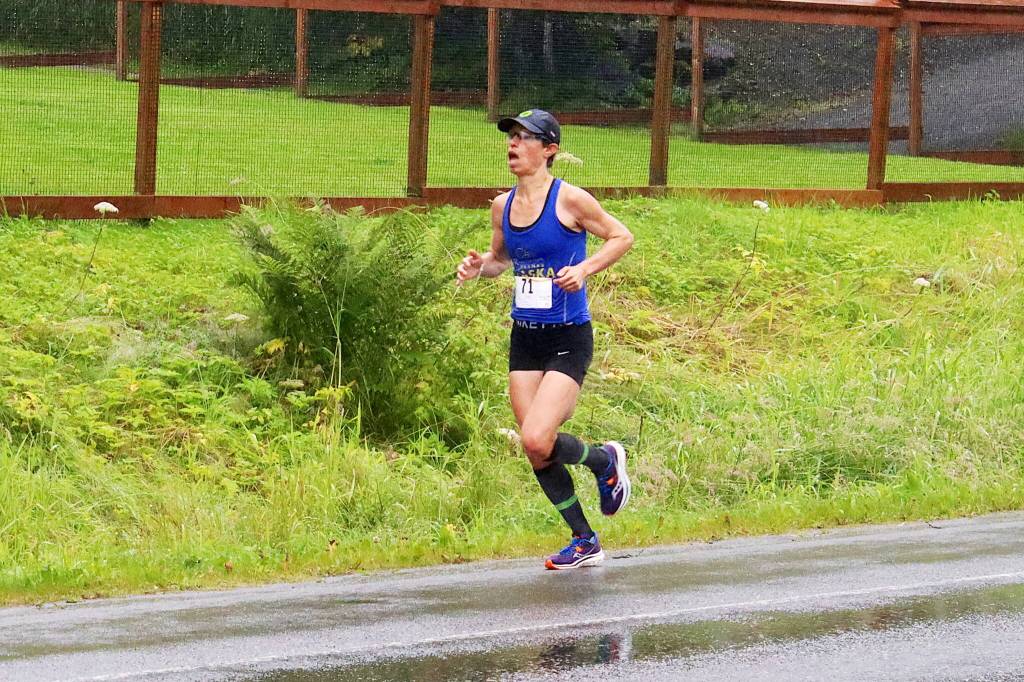 Shalane Frost, a Fairbanks resident, maintains a strong lead in the womens division about three miles from the finish line of the Juneau Marathon on Saturday. (Mark Sabbatini / Juneau Empire)