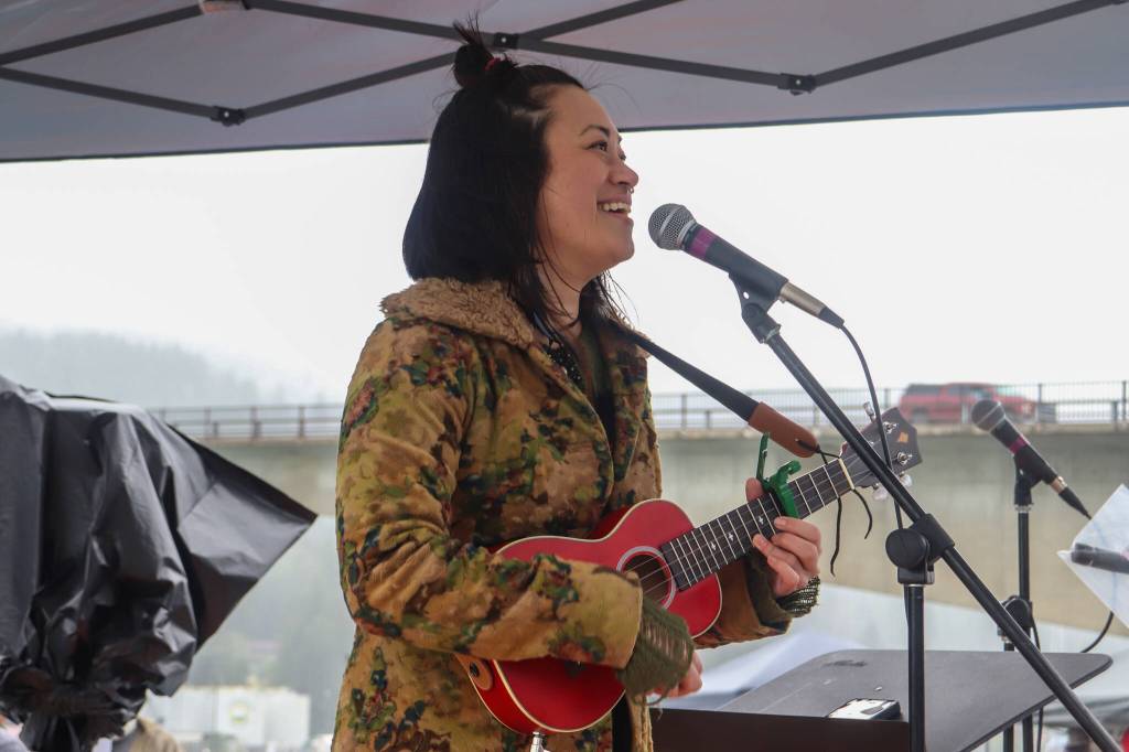 Lisa Puananimōhalaikalani Denny sings at the fourth annual Climate Fair for a Cool Planet on Saturday. (Jasz Garrett / Juneau Empire)