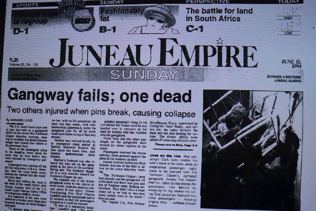 The front page of the Juneau Empire on June 12, 1994, featuring a photo showing Ed Quinto helping rescue passengers from a cruise ship gangplank that broke. (Mark Sabbatini / Juneau Empire)