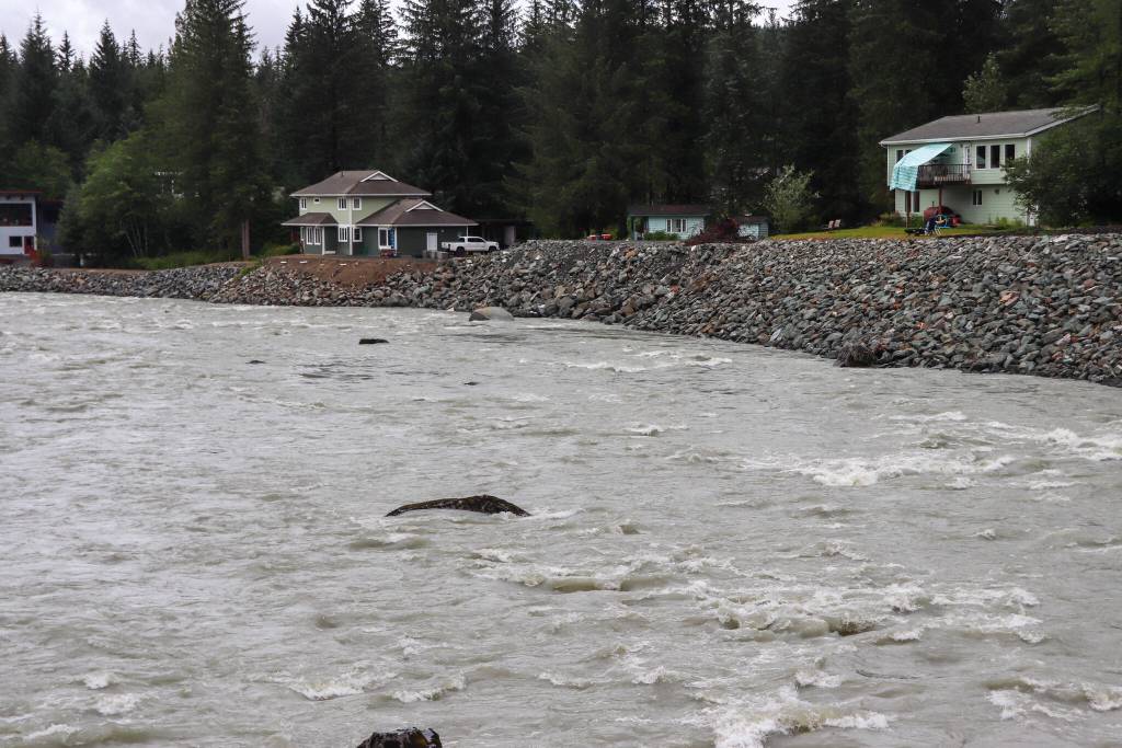 Rock fill added after last years flood aims to protect homes along the Mendenhall River. (Jasz Garrett / Juneau Empire)