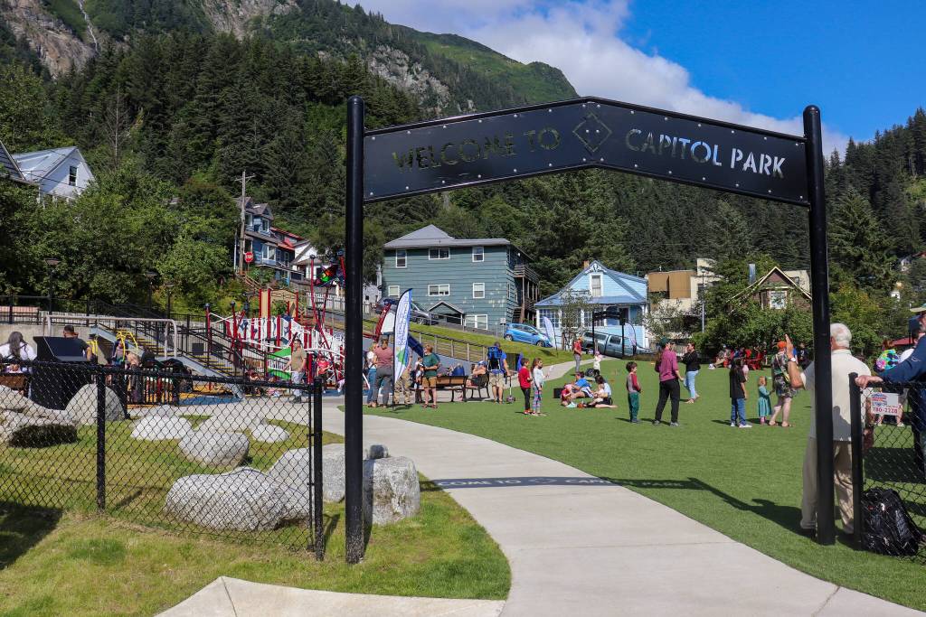 Juneau families enjoy Capitol Park on Saturday afternoon. (Jasz Garrett / Juneau Empire)