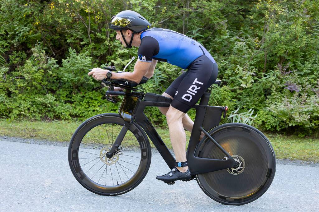 Jason Sosa, a Juneau resident, begins the bike leg of the Aukeman Triathlon on Sunday. He was the first-place male finisher in the sprint category of the race. (Photo by Bob Eastaugh)