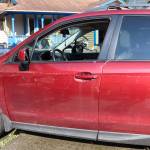 A water line is seen on Jessica Nardis car on Emily Way on Tuesday afternoon. (Jasz Garrett / Juneau Empire)