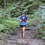 A runner nears the end of the Mount Roberts Trail during the Nifty Fifty Race on Saturday. (Mark Sabbatini / Juneau Empire)