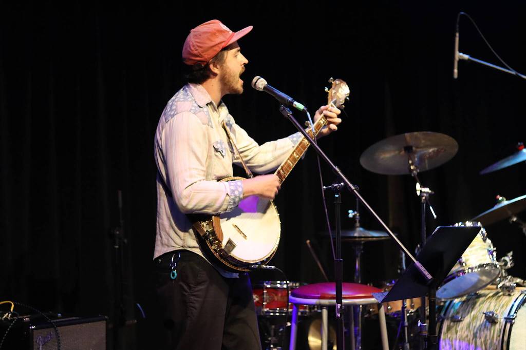 Stewie Wood performs what he calls hobo tunes during Voices for Steve: A Memorial Benefit Show at the Crystal Saloon on Saturday night. (Mark Sabbatini / Juneau Empire)