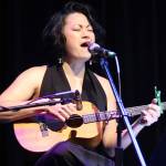 Lisa Puananimōhalaʼikalani Denny performs a song written for Steven Kissacks husky/malamute companion Juno during Voices for Steve: A Memorial Benefit Show at the Crystal Saloon on Saturday night. (Mark Sabbatini / Juneau Empire)