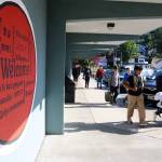 A sign on an exterior wall at Juneau-Douglas High School: Yadaa.at Kalé welcomes arriving students in many languages on the first day of school Thursday morning. (Mark Sabbatini / Juneau Empire)