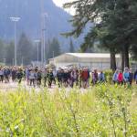 People walk two miles on the Kax̱dig̱oowu Héen Dei trail in support of Cancer Connection on Saturday. (Jasz Garrett / Juneau Empire)