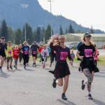 Ashley Murphy and Arianna Workman run toward the Kax̱dig̱oowu Héen Dei Trail in Cancer Connections 33rd annual Beat the Odds: A Race Against Cancer on Saturday. (Jasz Garrett / Juneau Empire)