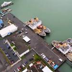 Buoy tenders dock at the U.S. Coast Guard station in downtown Juneau during the summer of 2023. The dock and adjacent property is where the Coast Guard plans to place support infrastructure for an icebreaker homeported in Juneau. (Screenshot from U.S. Coast Guard video)