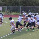 Juneau Huskies players scrimmage during practice on Tuesday at Thunder Mountain Middle School. (Jasz Garrett / Juneau Empire)